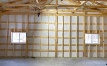 Amish Pole Barn Construction in Mannington, NJ - Rossbrook Construction Work-in-progess building, wooden walls and windows shown.