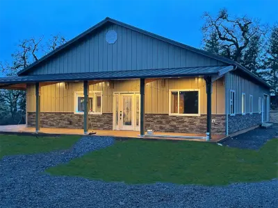 Amish Pole Barn Construction in Pittsgrove, NJ - Rossbrook Construction Completed pole barn at night.